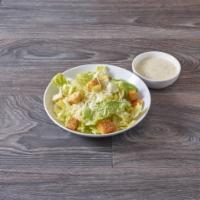 Caesar Salad · Romaine lettuce, seasoned croutons and shredded Parmesan cheese.