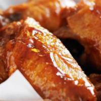 Hot Wings · 6 pieces. BBQ, hot, mild, and lemon pepper.
