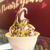 Large Bowl of Soft Serve / Frozen Yogurt · Our soft serve is made from scratch in our store with an almond and cashew base.