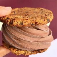 Ice Cream Sammies · Organic and gluten free chocolate chip cookies made with your choice of soft serve. Cookies ...