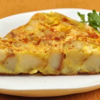 Tortilla Espanola · Omelette made Spanish-Style with potatoes, onions, olive oil and chorizo.