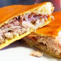 Media Noche Sandwich · Ham, cheese and pork on sweetbread.