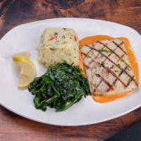 Grilled Mahi · Grilled Mahi on herbed rice with roasted broccolini