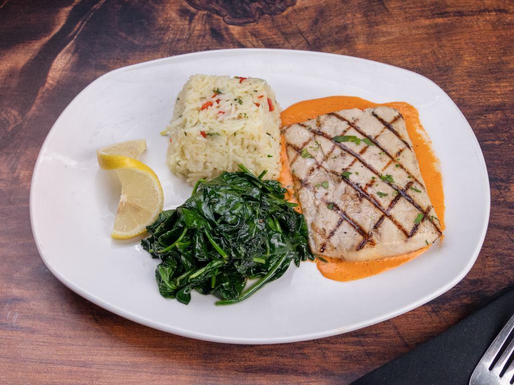 Grilled Mahi · Grilled Mahi on herbed rice with roasted broccolini