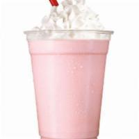 Strawberry Shake · Creamy, hand-scooped ice cream blended with real milk and topped with Whipped Topping. 