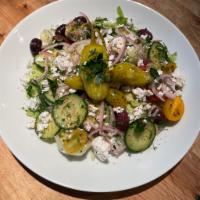 Greek Salad  · Feta, red onion, olives, tomato, cucumber.