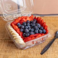 Acai Berry Bowl · 100% organic acai puree, double strawberries, double blueberries, and banana.

