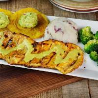 Pollo Velez · Grilled chicken churrasco served with mashed potatoes, tostones with guacamole & broccoli. A...
