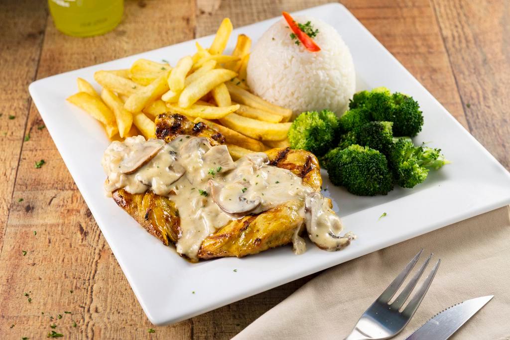 Pollo con salsa champiñones · Grilled chicken topped with our homemade mushroom sauce served with rice, french fries and broccoli