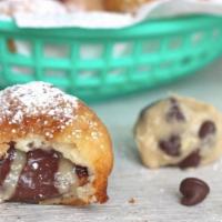 Cookie Dough · 4 chocolate chip cookie dough bites battered, topped with powdered sugar, and a side of choc...