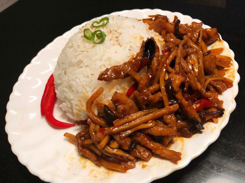 Rice topped w. Pork in Spicy Garlic Sauce · shredded pork in spicy garlic sauce, rice.