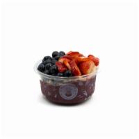 Pura Vida- Acai Bowl · Pure acai topped with granola, blueberry, strawberry, and honey. Acai bowl blended with pure...