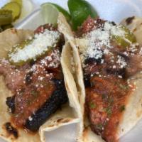 Beef Fajita Plate · Comes with 2 tacos on homemade flour tortillas and salsa. A side of charros beans and queso.