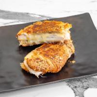 Multigrain croissant with turkey and cheese · Multigrain croissant with turkey and gouda cheese