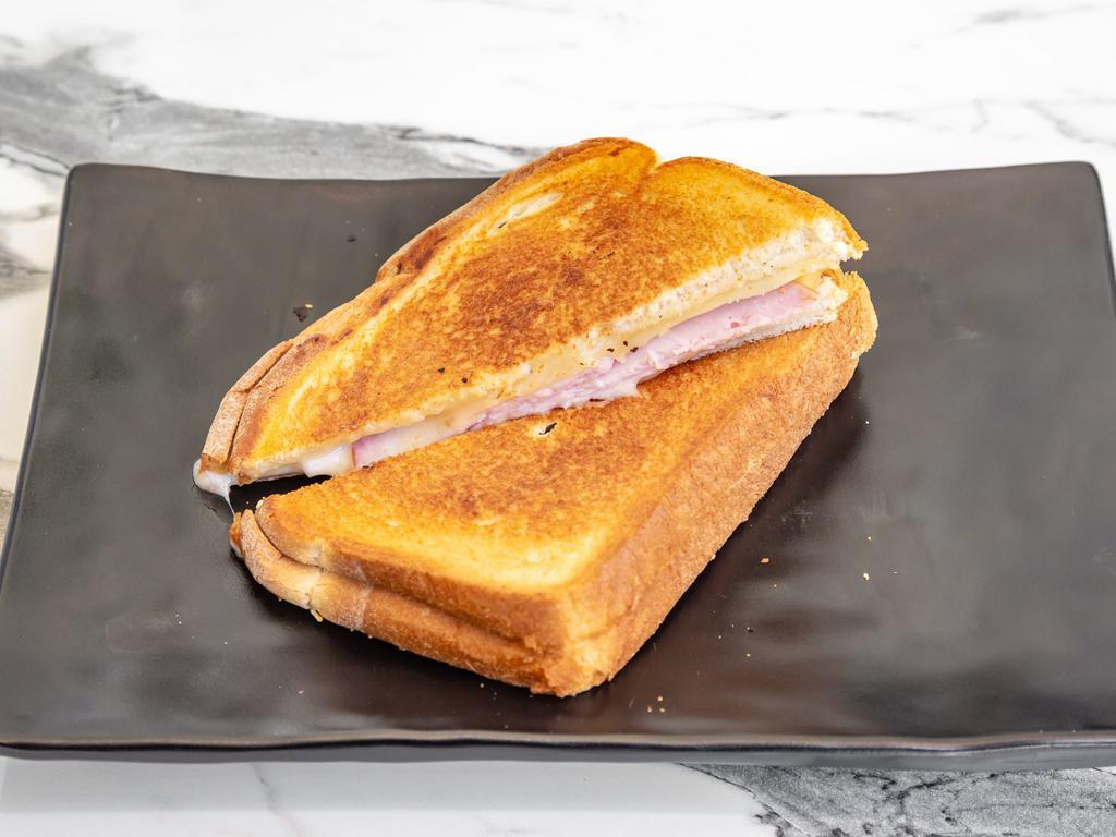 Toast with Ham & Cheese · White toast with ham and gouda cheese