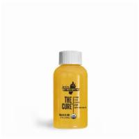 The Cure™ Shot · Orange, lemon, turmeric, ginger, apple cider vinegar, onion, horseradish, garlic, habanero p...