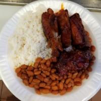 12. Costillas, Arroz and Habichuelas Lunch Special · Ribs, rice and beans.
