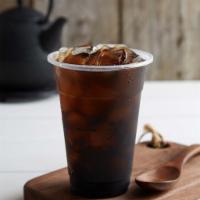 Medium Grass Jelly Tea 關西仙草茶（中） · Grass jelly topping not included.