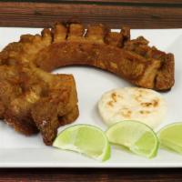 Pork Belly · Fried pork belly with small arepa