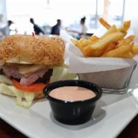 Regular Hamburger · Cheese, lettuce, tomato and onions with french fries.