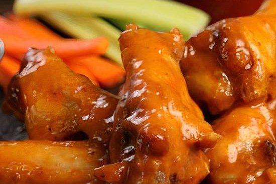 Mango Habanero Wings · Nothing says summer quite like Mango Habanero. The sweet fruity flavor of mango combined with the fiery heat of habanero will take your wings to new heights.
