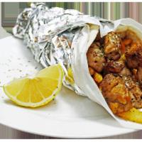 H4. Chicken Gyro  Lunch · Seasoned Halal Chicken wrapped in a gyro bread with lettuce tomatoes and special white and h...