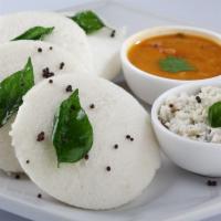 3 Pieces Idly · Steamed rice and lentil cakes served with sambar and chutney.