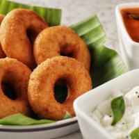 3 Pieces Vada · Fried lentil donuts. Served with 2 chutneys and sambar.