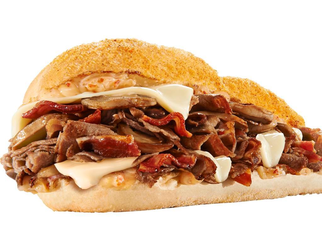 Zesty Bacon and Swiss Steak™ · ALL NATURAL STEAK, bacon, mushrooms, Swiss American cheese, zesty mayo, & raspberry chipotle topping.  
7