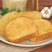 Garlic Bread · Oven-baked bread brushed with a buttery garlic sauce and sprinkled with a blend of spices.