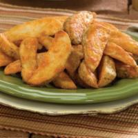 Steak Fries · Thick slices of potatoes seasoned and baked to a golden finish. Crispy on the outside, flaky...
