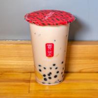 Cold Earl Grey Milk Tea with 3 J’s · Pearls, pudding & herbal jelly.