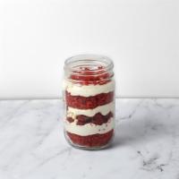 Red Velvet Jar · Red velvet cake, dark chocolate pearls, and vanilla cream cheese frosting.