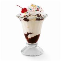 KID'S SUNDAE · Two layers of Hershey’s® chocolate syrup, soft serve, whipped cream, rainbow sprinkles and a...