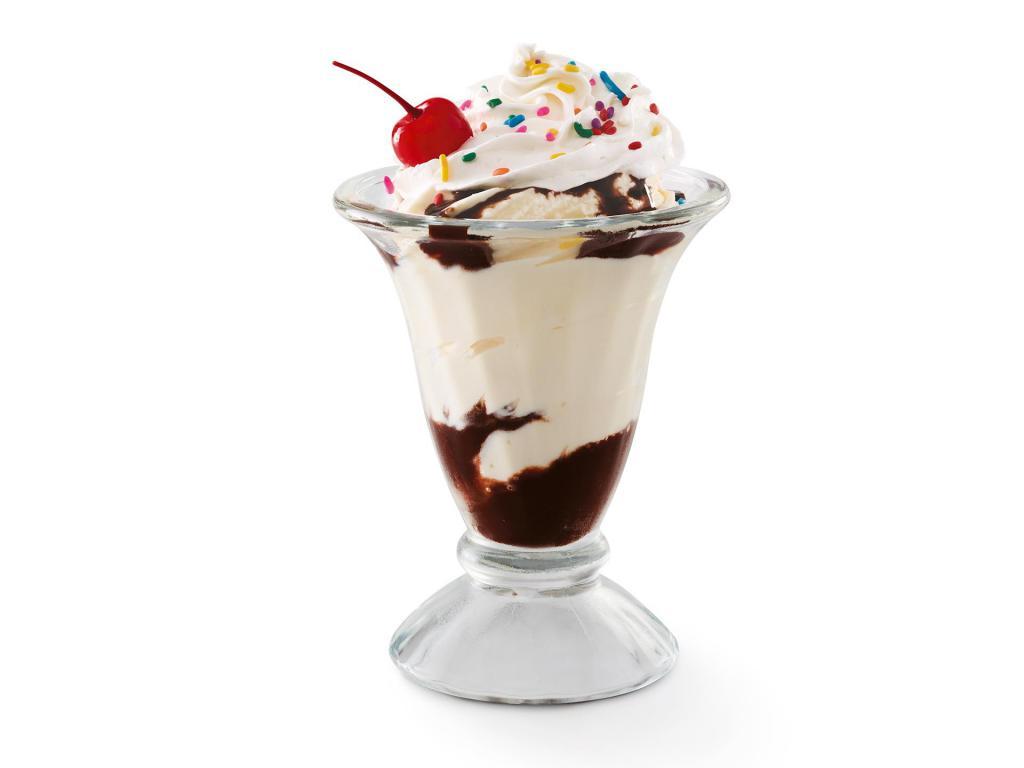 KID'S SUNDAE · Two layers of Hershey’s® chocolate syrup, soft serve, whipped cream, rainbow sprinkles and a cherry on top.
