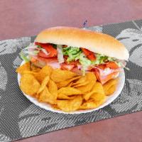 A6. Italian Sub Lunch · Ham cappy, Genoa salam, pepperoni, provolone, roasted peppers, lettuce and tomato.