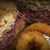 B9. Pastrami Reuben Sub Lunch · Smoked and cured beef sub.
