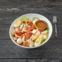 Italian Salad · Lettuce, tomatoes, cucumbers, boiled egg, crispy bacon, fresh mozzarella and grilled chicken.