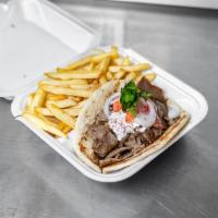 4. Gyro Combo  ·  Sliced grounded lamb come on pita bread with Taziki Sauce, tomatoes, onion. Served with dri...