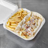 6. Chicken Shawarma Combo · Wrap. Lettuce, garlic, pickles, and fries. Served with drink and fries. 