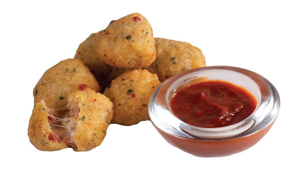 Pepperoni Pizza Bites · Breaded pizza bites stuffed with pepperoni and cheese, served with marinara dipping sauce.
Reg: 698 cal.  LG: 1006 cal. 