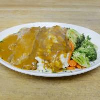 Pot Roast Dinner · Homemade pot roast cooked to perfection smothered in beef gravy and served with mashed potat...
