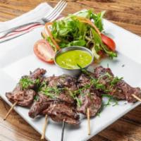 Grilled Steak Skewers · Herb chimichurri, mixed salad
