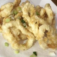 6. Fried Calamari · This comes with our special dipping sauce. Add sauce upon request. Add rice for an additiona...