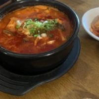 18. Haemul Soondubu Jjigae · Our popular seafood soft tofu stew contains various of vegetables and egg. Spicy. 