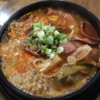 44. Budae-Jjigae · Popular army stew and ti comes with a side of ramen noodle. 