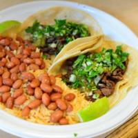 2 Tacos with a Side · Choose two tacos and a side of either rice and beans or french fries. 