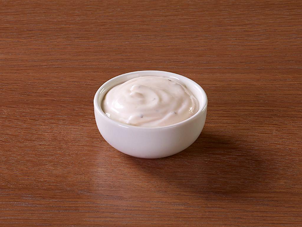 Ranch Dipping Sauce · Pair your wings or crust (we aren't judging!) with this classic cool-and-tangy ranch sauce, made with the perfect blend of herbs and spices.