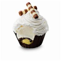 Sweet Cream Cupcakes · A rich Chocolate Cup filled with a layer of Yellow Cake, Fudge and Sweet Cream Ice Cream top...