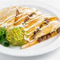Quesadilla · Add any meat for an additional charge.